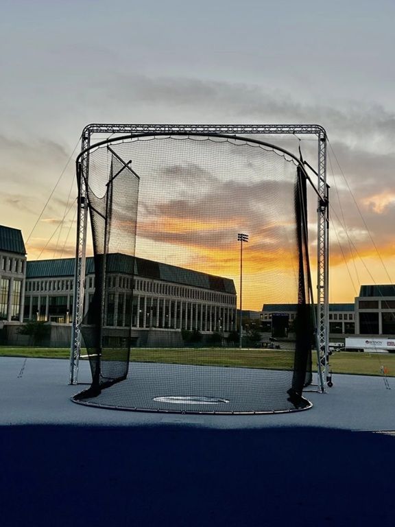 US Naval Academy track and field hammer and discus throws cage 